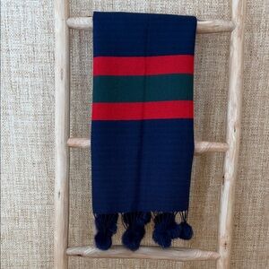 Navy Wrap with Red and Green Stripes and Navy Pom-pom Accents